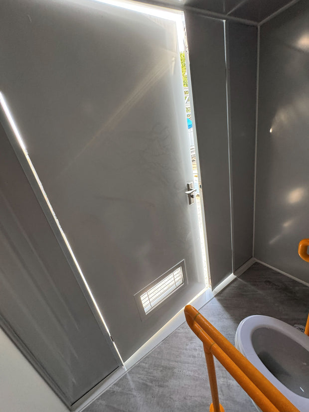 Premium Plumbed-In disability-friendly Portable Toilet With Shower Unit with WPC Fluted Wall Cladding – Fully Built & Ready to Use
